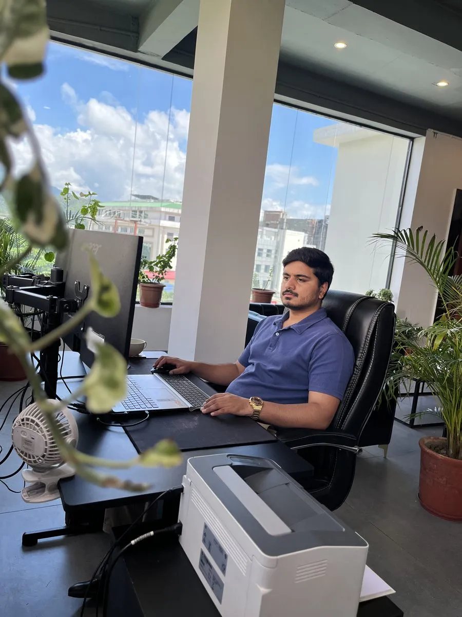Prosynergy team member working on client books